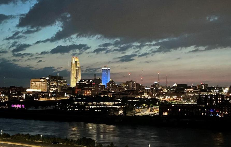 Missouri River through downtown Omaha at night